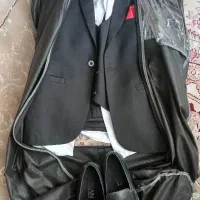 کت و شلواروجلیقه مشکی با پیرهن سفید مناسب ۱۱سال