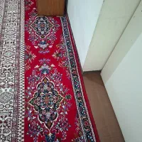 وسایل خانه بخاری کمد لباسشویی  کنار  میز تلویزیون