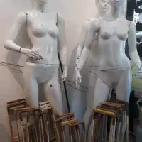 مانکن و تعدادی تخته برای پارچه