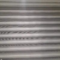 پرده زبرا یه مکانیزه طوسی روشن سفید نو وسالم