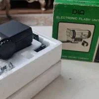 فلش دربین کنون و شارژر باطری،