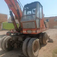 بیل میکانیکی لاستیکی