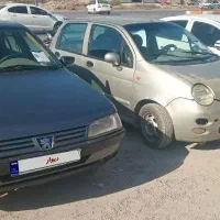 دوعددماشین ام وی ام ۱۱۰ و پژو ۴۰۵