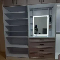 ساخت ونصب کابینت کمددیواری وتخت کمجاتخصصی ودقیق