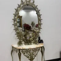 اینه و شمعدان برنجی