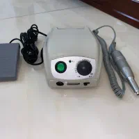 دستگاه کاشت ناخن
