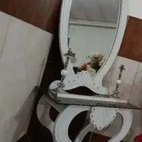 ایینه و کنسول و شمعدان