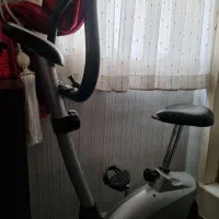 دوچرخه ثابت وکمربند ویبره چربی سوز|تجهیزات ورزشی|اندیشه, اندیشه فاز ۴|دیوار