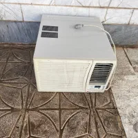 کولر گازی و پشت پنجره ای