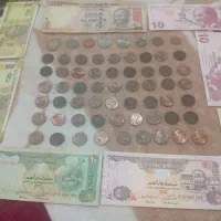 تعداد. ۸ اسکناس و ۶۲ سکه خارجی