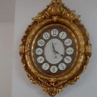 ساعت دیواری طلایی لوتوس