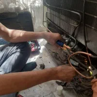 تعمیر انواع یخچال فریزر،ساید،ماشین لباسشویی در محل