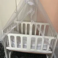 تخت گهواره ای کودک