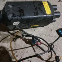 بخاری در جا ۱۲ ولت ومزدا دوکابین