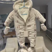 کاپشن نوزاد سرهمی