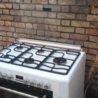 اجاق گازفردار سینجر ایتالیا درحدنو مجهز به کانوکشن|اجاق گاز و لوازم برقی پختوپز|تهران, کاج|دیوار