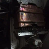 ابگرمکن‌دیواری‌سوزان‌سالم‌با‌2تاچراغ‌اسپانیا