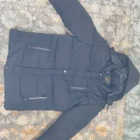 کاپشن|لباس|بم, |دیوار