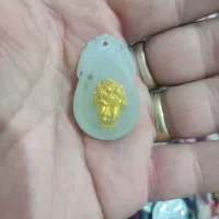 فروش اویزکهنه که خودش سنگ هست داخلش گوی طلاست