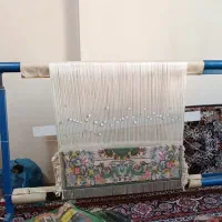 دار قالی با فرش نیمه کار پادری