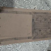 دوزنده لباس دست دوز