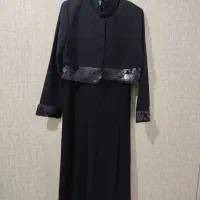 یک عدد کت و جلیقه و شلوار وچند پیراهن مجلسی