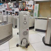 رادیات شوفاژ روغنی بخاری برقی ژاپنی|آبگرمکن، پکیج، شوفاژ|همدان, |دیوار