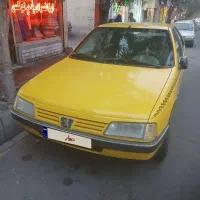 یک دستگاه تاکسی پژو ۴۰۵ مدل ۹۵