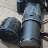 یک عدد دوربین کنون ۱۲۰۰ d