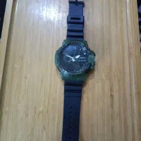 ساعت رنگ سبز برای فروش مارک|ساعت|کنار تخته و کمار, |دیوار