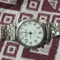 یک عدد ساعت مچی