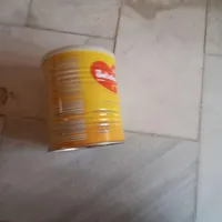 قوطی شیر خشک خالی