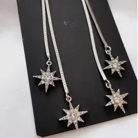 گوشواره آویز بلند ستاره نگینی نقره ای