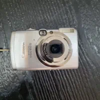 فروش دوربین Canon IXUS 950 IS معیوب لنز ارور