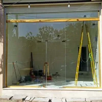 دفتر شیشه سکوریت و کرکره برقی تبریز