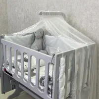 تخت کنار مادر یا گهواره