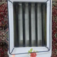 یک عدد کباب پز نو