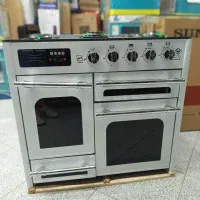 اجاق گاز چهار درب طرح فر رویه شیشه و رویه استیل