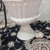 گلدان و قفسه