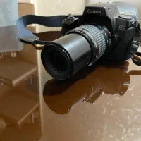 دوربین عکاسی کنون ۱۰۰۰f به همراه فلاش و کیف|دوربین عکاسی و فیلم‌برداری|تهران, مهران|دیوار