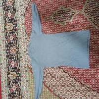 بافت|لباس|مشهد, کوی ولیعصر|دیوار