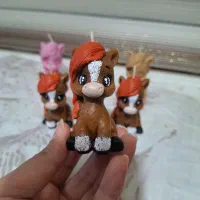 شمع نماد سال اسب و کتیبه سال نو