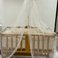 تخت کنار مادر نوزاد ننوئی