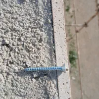 پیچ و رولپلاک سنگ نما