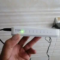 سوئیچ 8پورت دی لینک همراه با آداپتور