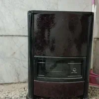بخاری .میز تلویزیون.قالی.کمد لباس.میز درسی کودک