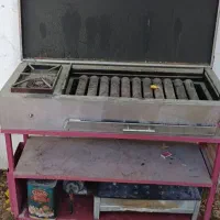 کباب پز . باربیکیو