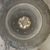 یک عدد لاستیک بارز۷۰ درصد پژوهی با رینگ|قطعات یدکی و لوازم جانبی|فولادشهر, A6|دیوار