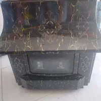 بخاری گازی طرح شومینه