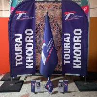 چاپ پرچم ساحلی برزنتی بادبانی ضدآب تابلو بنرشبرنگی